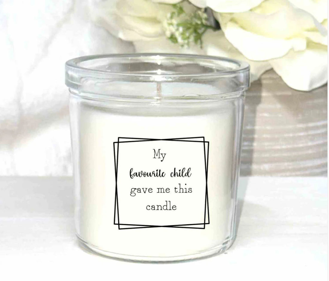 Candle with gift box and matches.