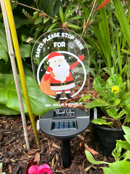 Solar Light Santa Stop Here Sign for the Garden.